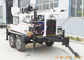 4 व्हील ट्रेलर घुड़सवार के साथ हाइड्रोलिक रोटेशन वॉटर वेयर ड्रिलिंग उपकरण